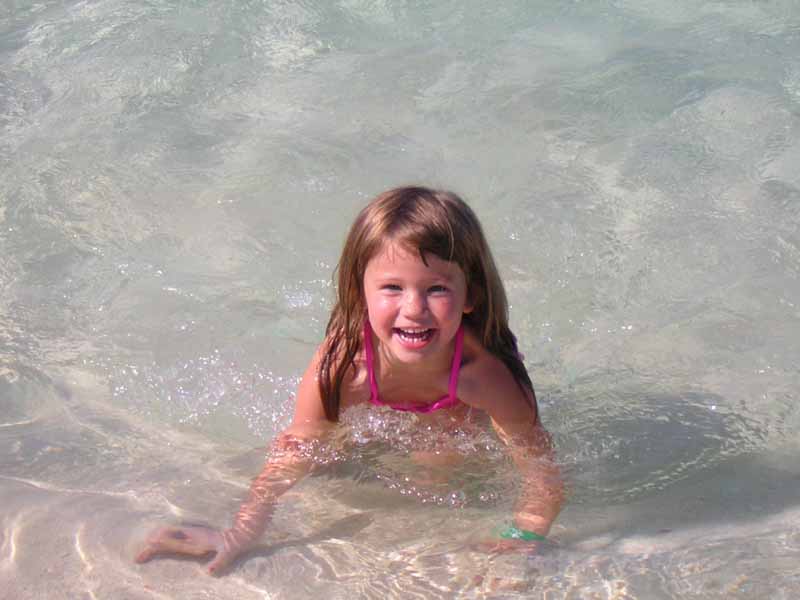 Heather in the crystal clear waters, Grand Cayman